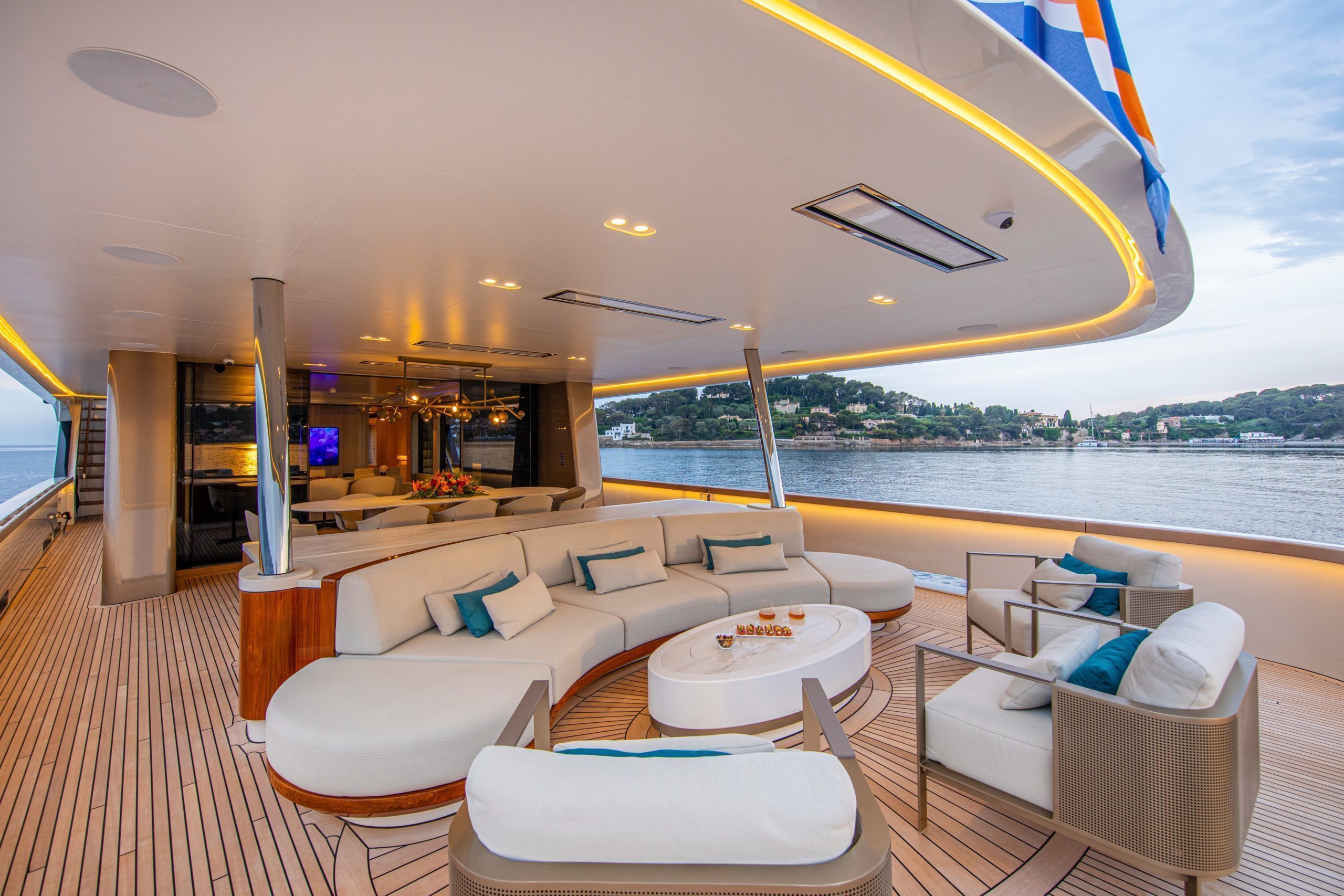Luxury yacht interior at sea, refined private travel atmosphere