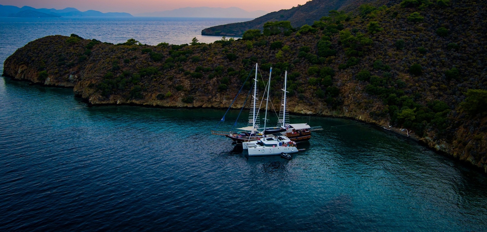 Traditional gulet yacht anchored in a Mediterranean bay — Turkish Riviera sailing experience